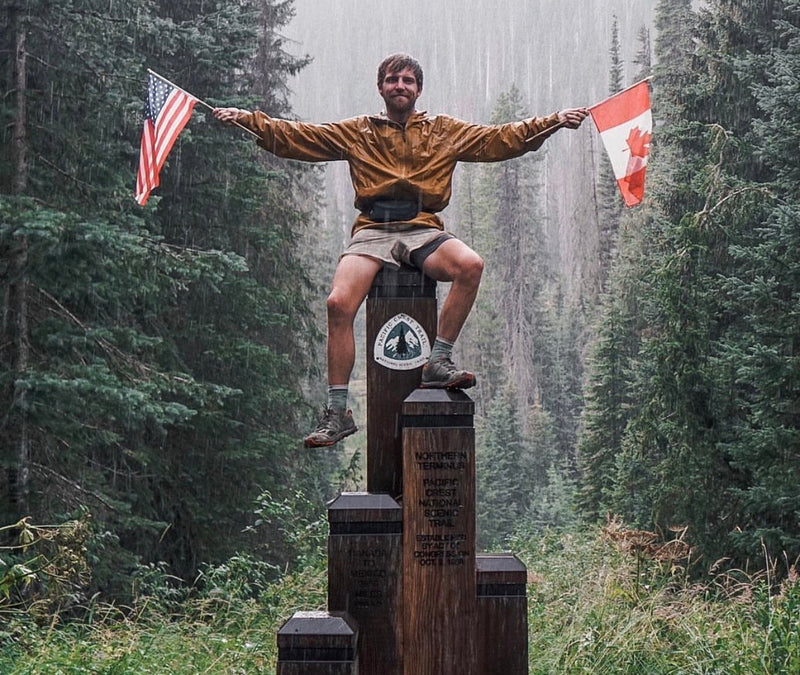 Jack at the USA/Canadian border at the end of the tour divide